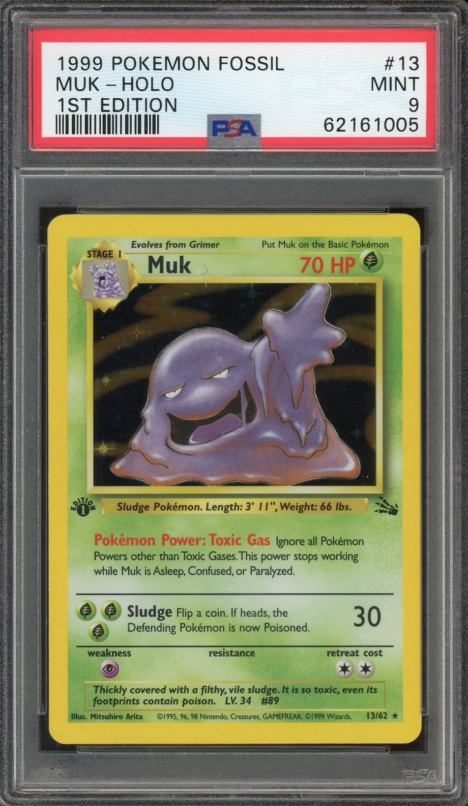 PSA 9 MUK HOLO 1ST EDITION FOSSIL