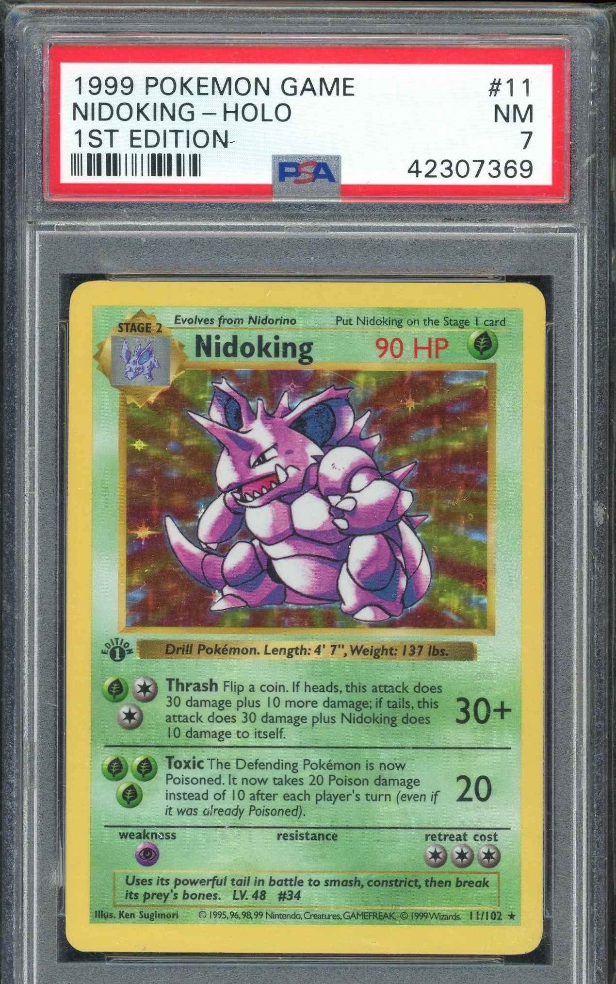 PSA 7 NIDOKING-HOLO 1ST EDITION