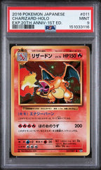 PSA 9 CHARIZARD-HOLO 20TH ANNIV-1ST ED.